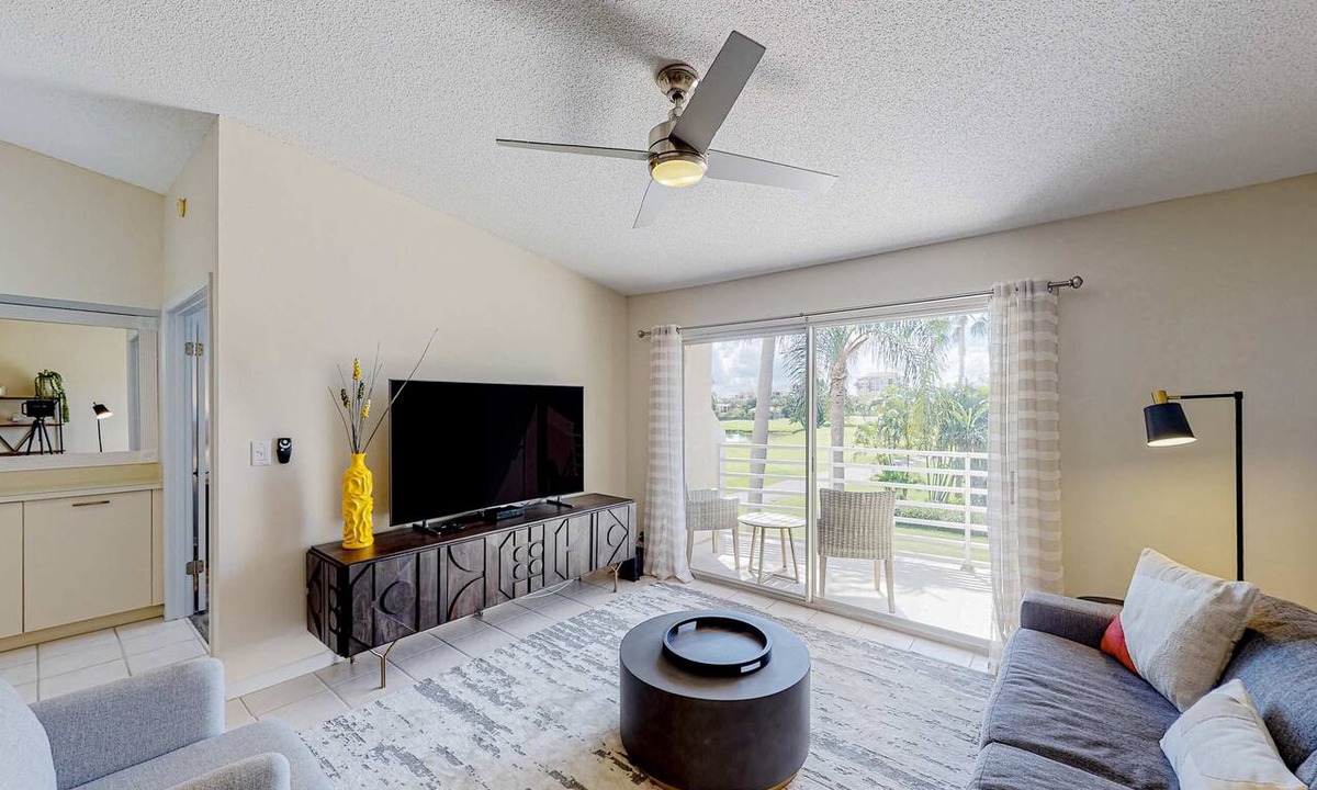Isla del Sol Condo | 2nd Floor Condo Overlooking Country Club Greens w Free WiFi AC and Shared Pool