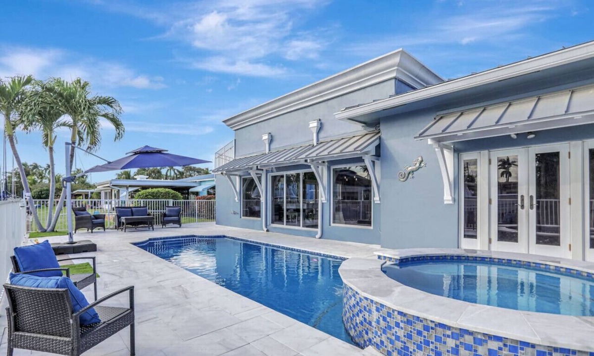 South New River Isles House | 3BR Waterfront Villa with Heated Pool, Spa, & Rooftop Deck