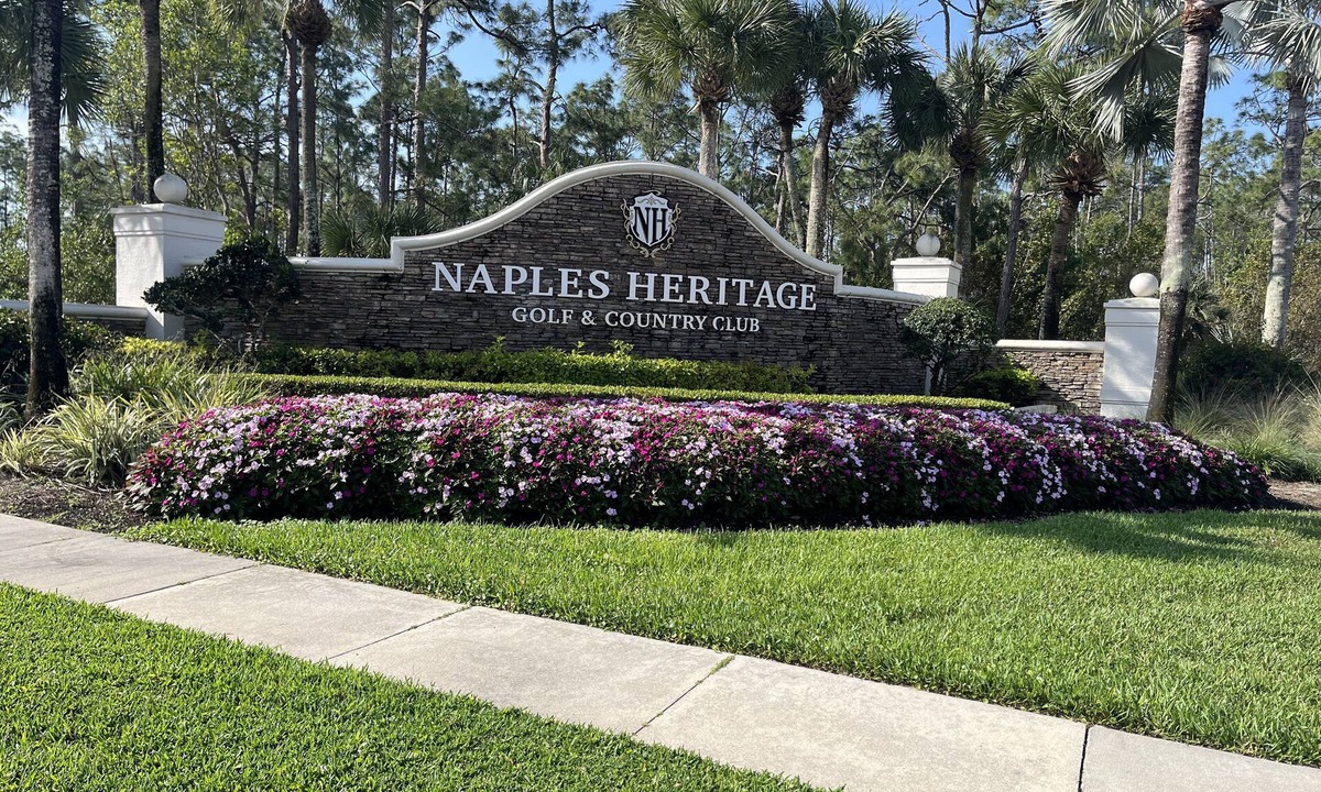 Naples Heritage Condo | Beautiful updated newly furnished condo over looking the lake and 11 green