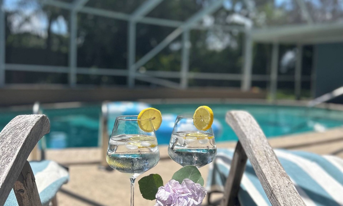 Fort Pierce House | Bright spacious beautifully designed pool home with fireplace fast wifi sleeps 8
