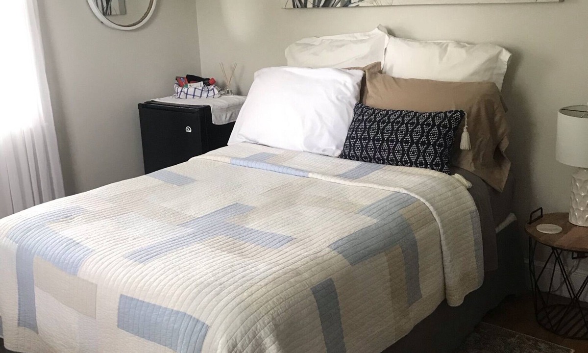 Springdale House | Charming bedroom for busy travelers needing a functional place to stay
