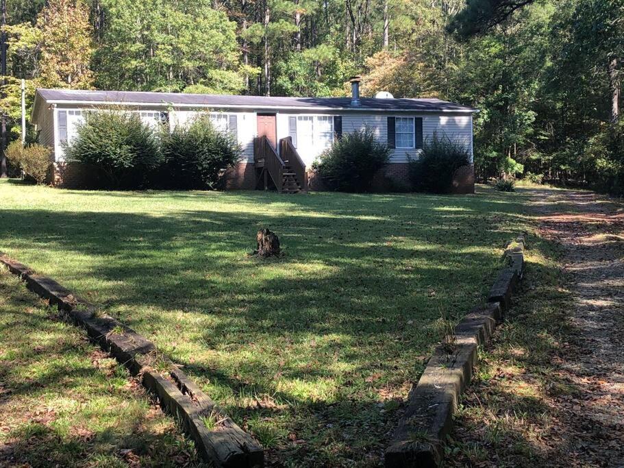 Leesville House | Chrystal Cove a 10 minute walk behind home is Lake Murray
