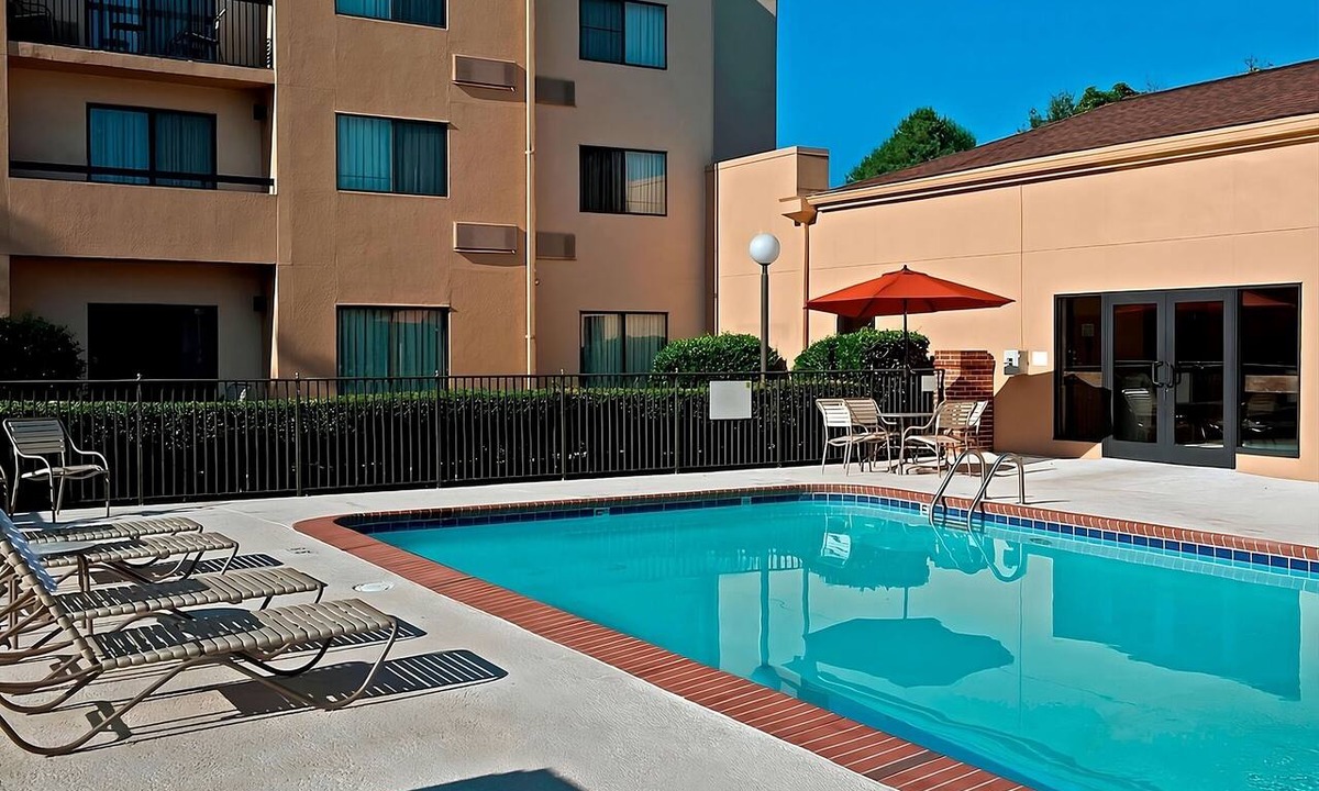 University Place Hotel | Cozy Escape Near Charlotte Motor Speedway| Seasonal Pool Access & Pet-Friendly