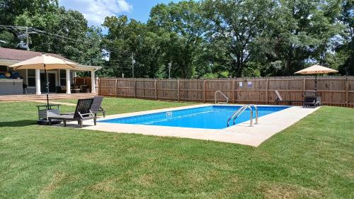 Stone Mountain Historic Village Villa | Cozy Staycation Getaway with Huge Backyard