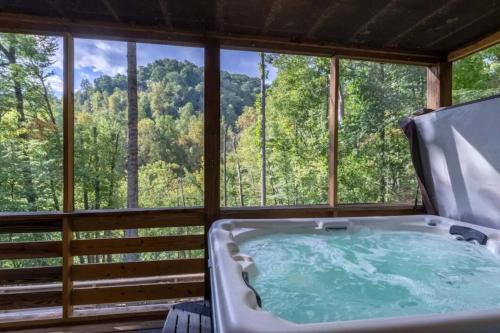 Sylva House | Crashing Creek Cabin - Hot Tub, Mountain Views and King Bed