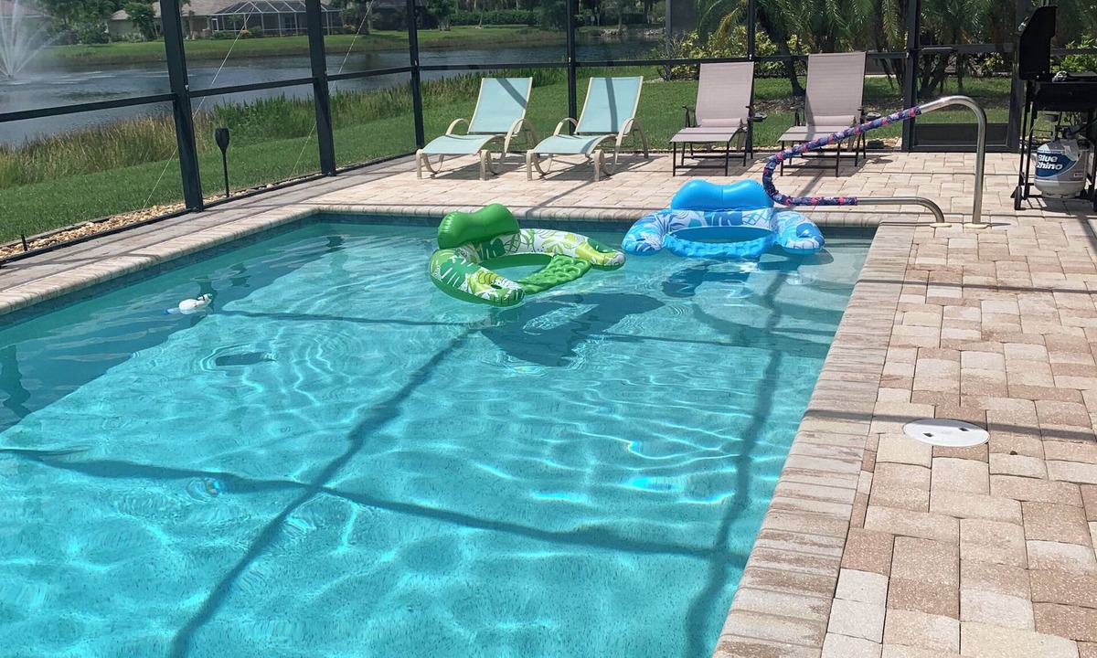 Beachwalk Isles House | Enjoy amazing sunsets over the lake with private, heated pool. Quiet subdivision