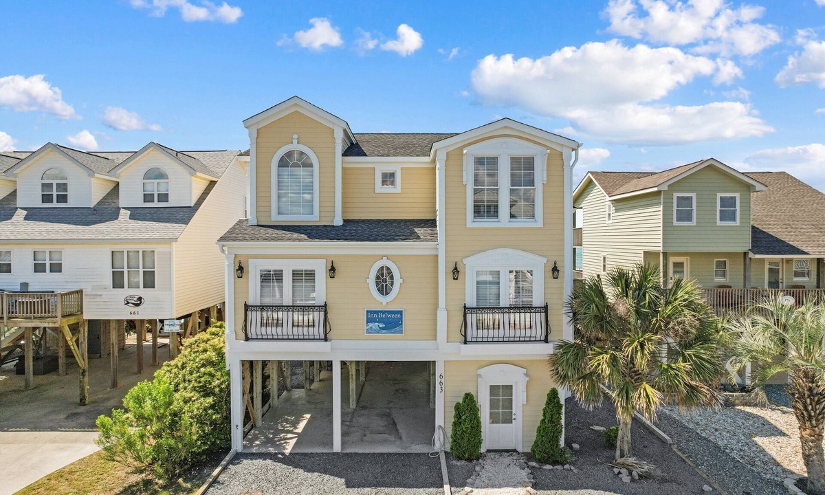 Holden Beach House | Experience oceanfront bliss at Inn Between, a spacious 6-bedroom getaway in Holden Beach.