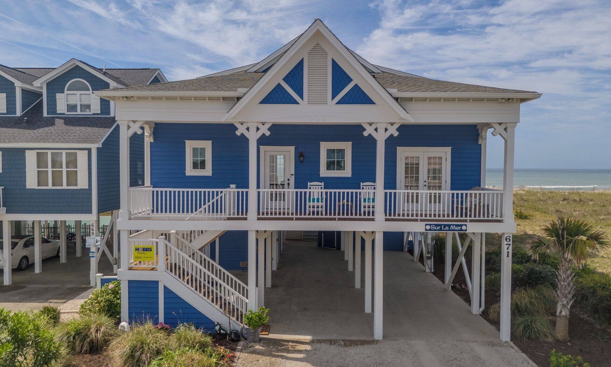 Holden Beach House | Experience oceanfront luxury at Sur La Mer, a 5-bedroom dog-friendly retreat with a private pool.