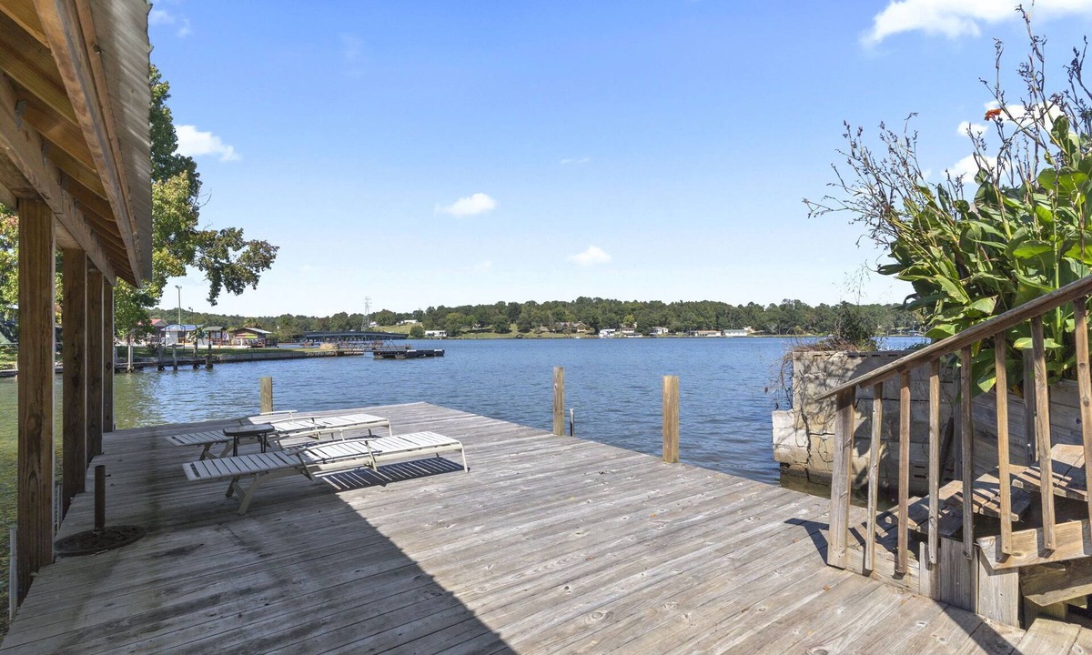 Greenwood House | Family - Friendly Lakefront Home with a Covered Boat-slip.