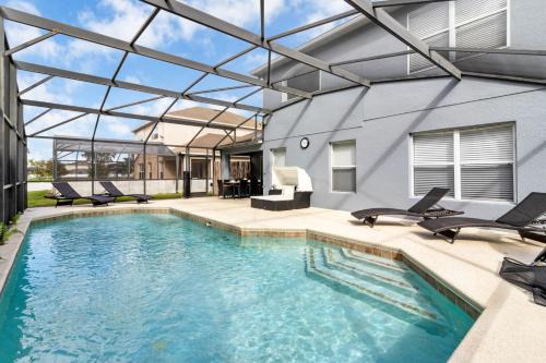 Seasons House | Family Oasis 5BR Villa with South Facing Pool and Games Room Near Disney