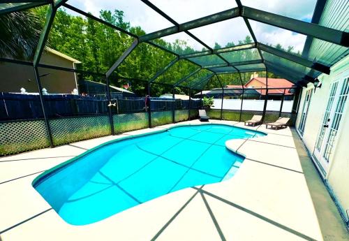 Buena Ventura Lakes House | FREE Heated Pool 9 minutes to MCO 15 minutes to Disney Sleeps 8