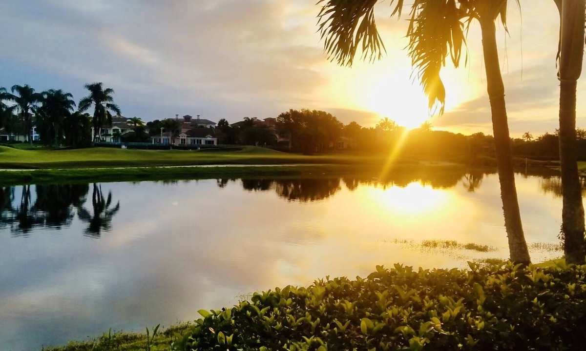 St. David's Island House | Gated Grand Harbor Townhome with beautiful views of the golf course and water