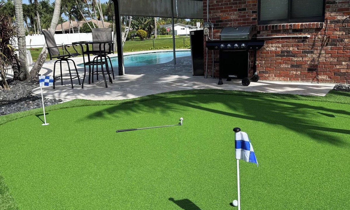 Florida North Atlantic Coast House | Heated pool, Putting Green, propane fire pit, outdoor shower waterfront home 4 U