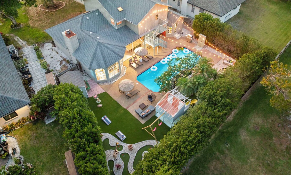 Palma Sola House | Hot Tub, Heated Pool Resort Home w/Mini Golf! Sleeps 20!
