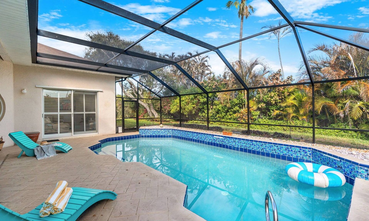 Melbourne Beach House | Melbourne Beach Oasis Home W/Ground‑Floor Patio, Heated Pool, Lanai & Backyard Retreat 🌴🌊