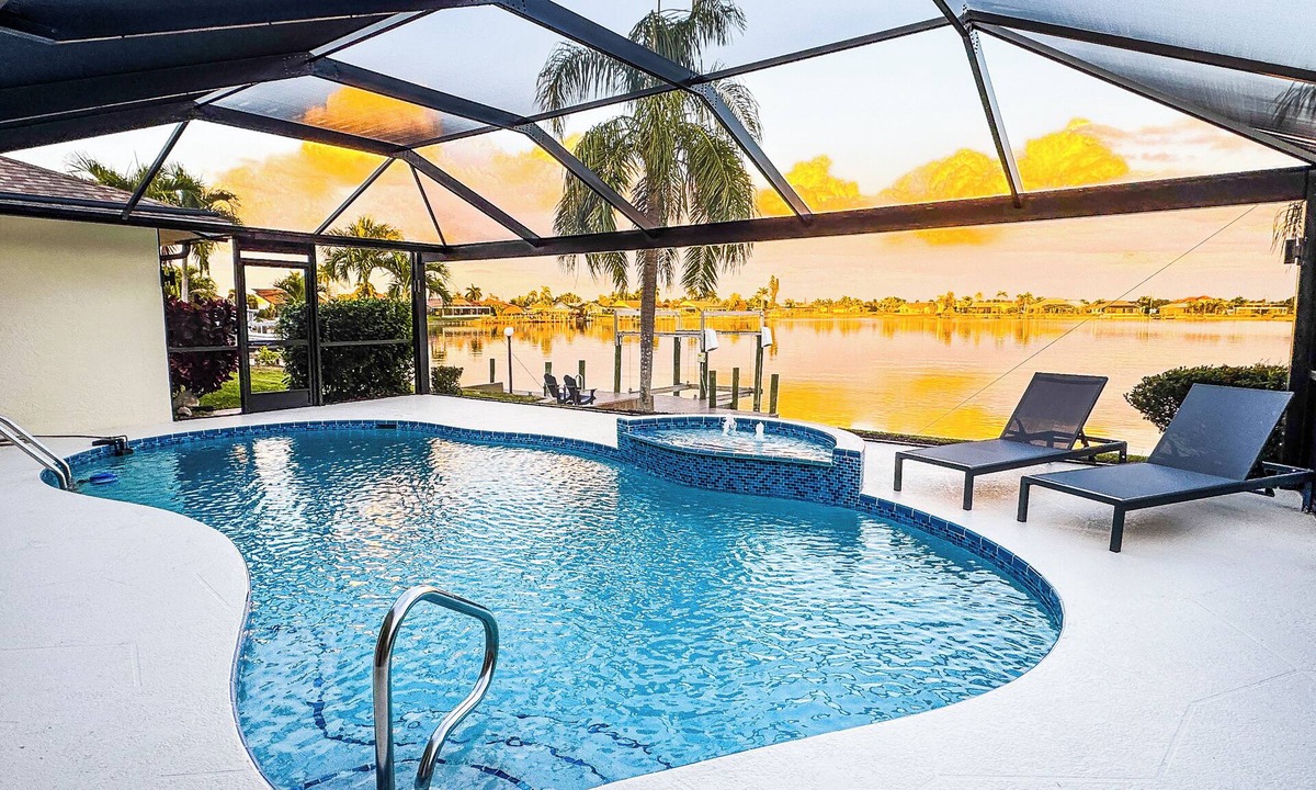 Eight Lakes House | Modern lake front villa w/beautiful views & bikes! Villa Dawn - SWFL Rentals