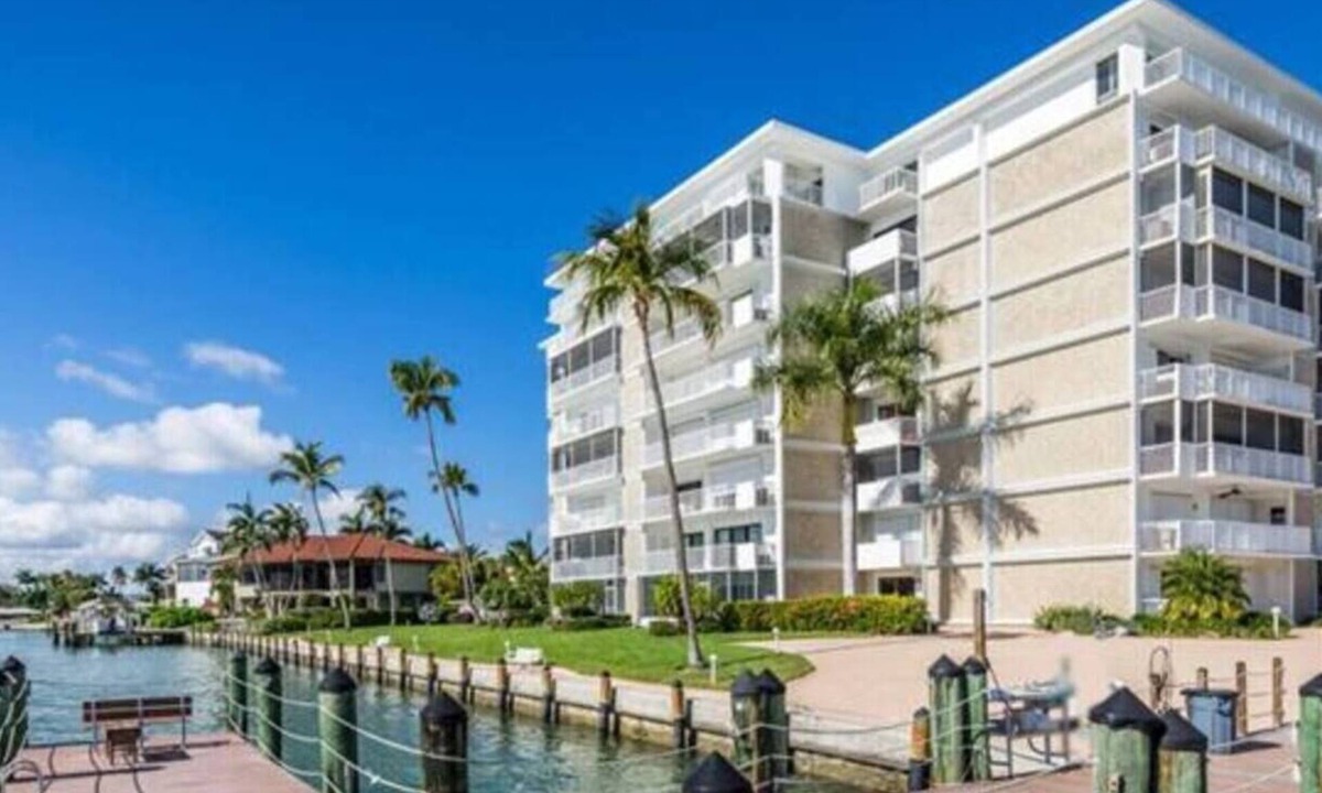 Isles of Capri Apartment | Paradise on the Isles - Stunning Waterfront Views - Pool & Dock Steps Away