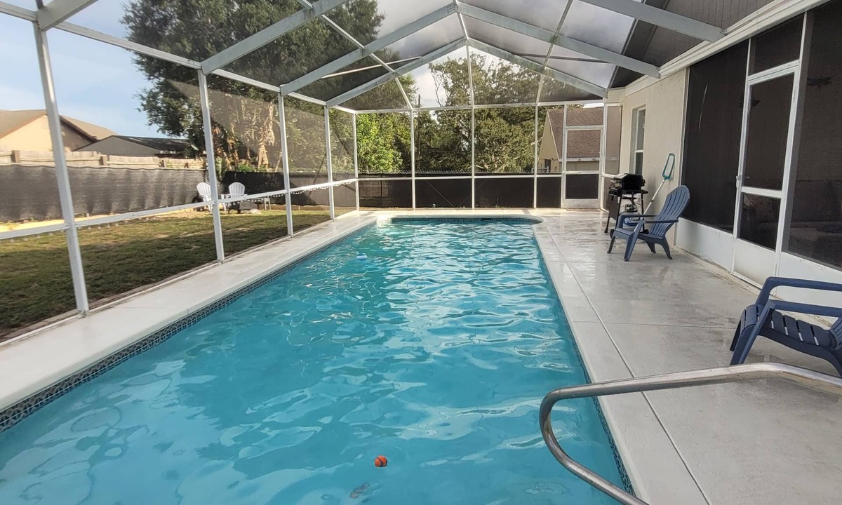 Lake Wales House | Relax in this remodeled home with screened 36-ft pool, patio & fire pit.