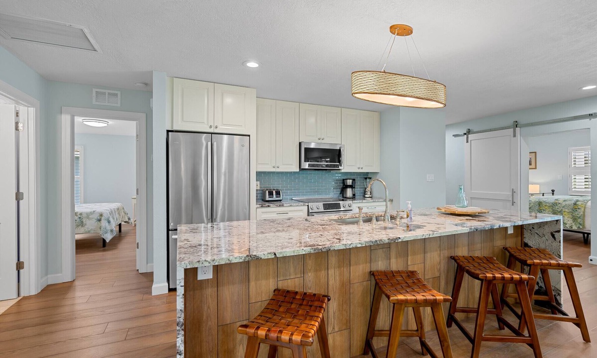 Kings Lake House | Rovigo Vacation Rental: Spacious Retreat with Panoramic Lake Views in Kings Lake. 4-BR, 4-Bathroom Home with Private Pool, just 3.4 Miles from the Vibrant Fifth Avenue South and Naples Attractions
