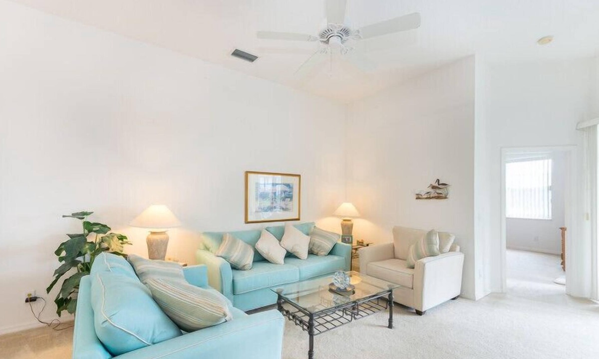 Calabay Parc Villa | South Facing Pool beside palms and grassland. Light, Spacious with Games Room ,