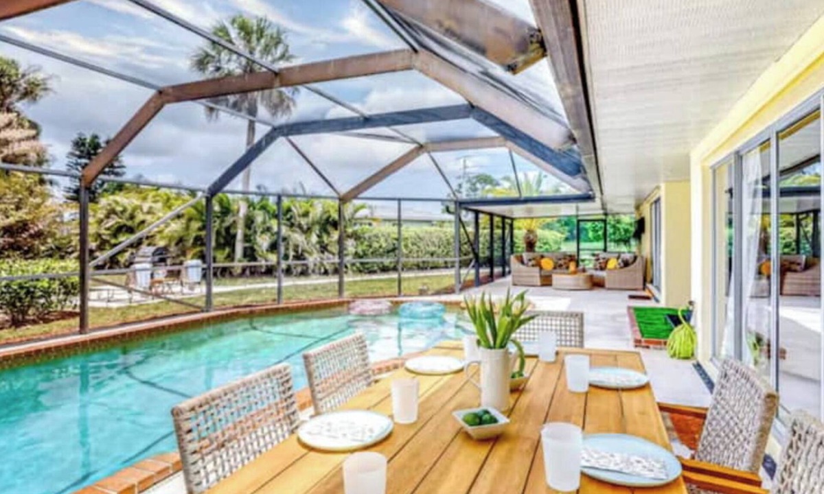 Port Saint Lucie House | Spacious 4BR Lakefront Getaway – Heated Pool, Hot Tub Near Everything!
