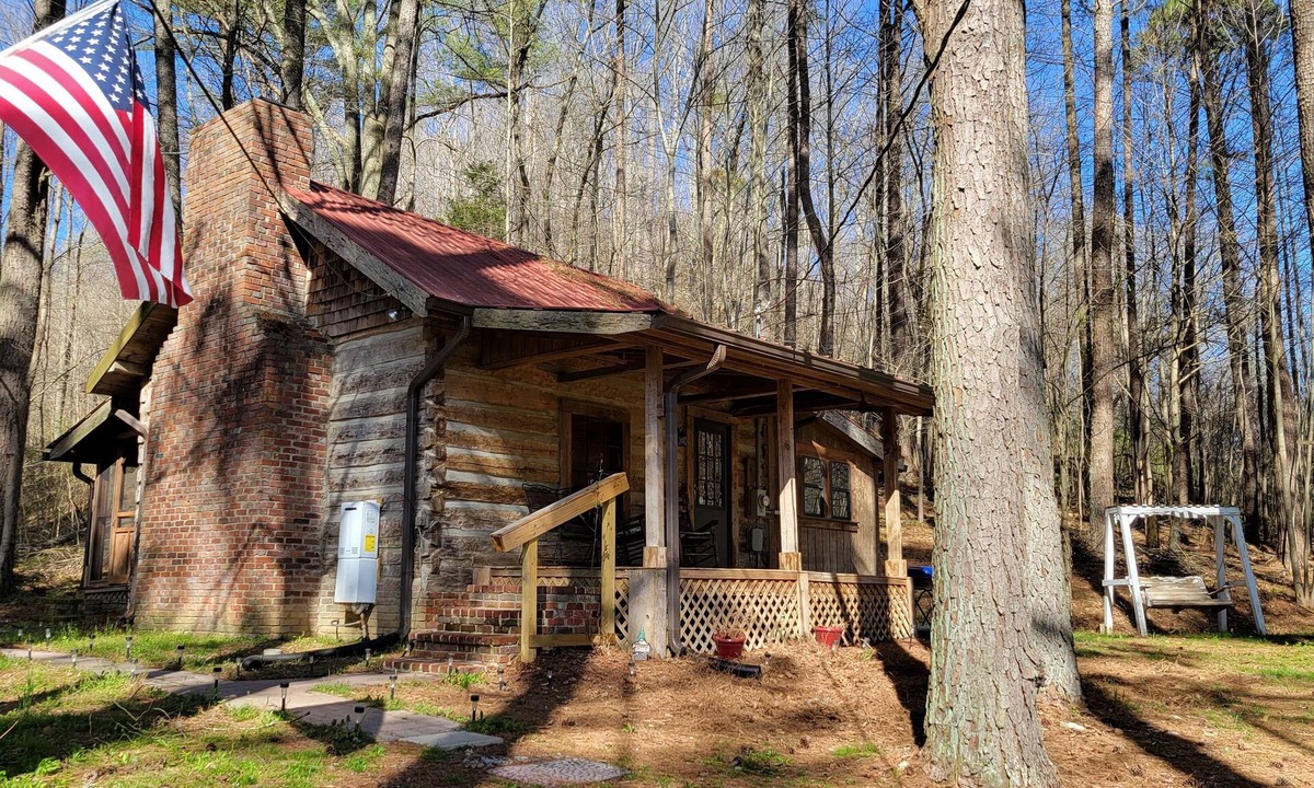 Bethpage House | Step Back in Time: Cozy Log Cabin on 5 Private Acres with Fiber Internet!