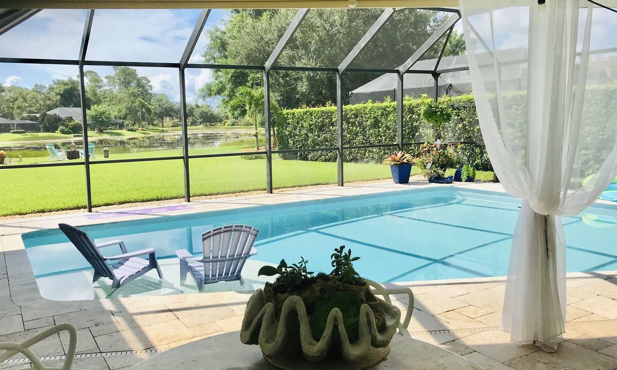 Kings Lake House | Swimming pool, lake view, minutes to Naple's downtown and beach.