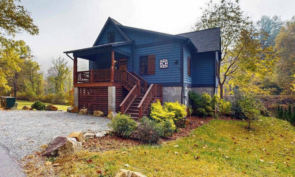 Cullowhee House | Take in the natural beauty from this elegant riverfront home