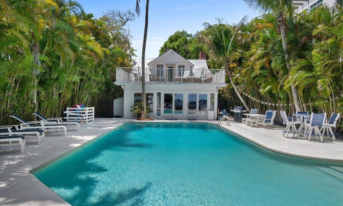 Stuart House | The Coastal Manor Waterfront Pool Home- 2BR/2BA