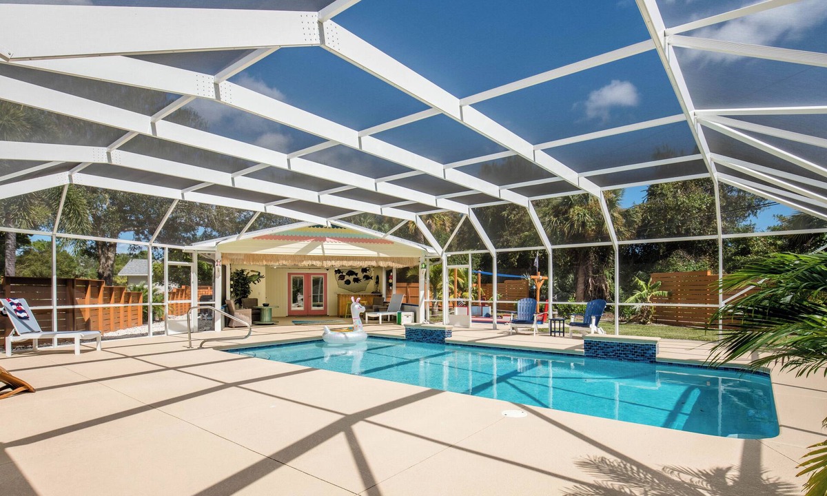 Vero Beach House | Tropical Getaway! Heated Pool, Tiki Bar, Pirate Sandbox, and Boat Parking!