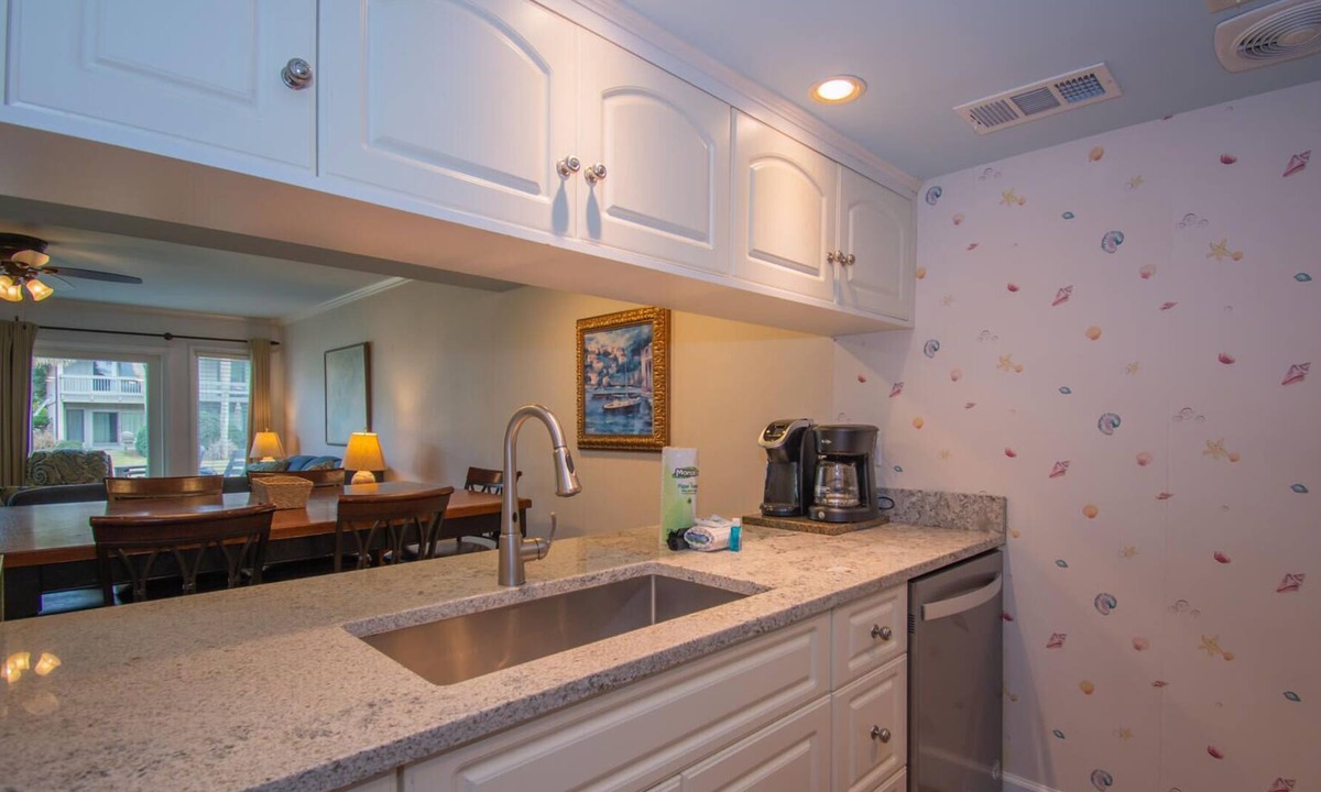 Saint Helena Island Condo | Two-Story Condo with Private Deck, WiFi, & Courtyard Pool Access