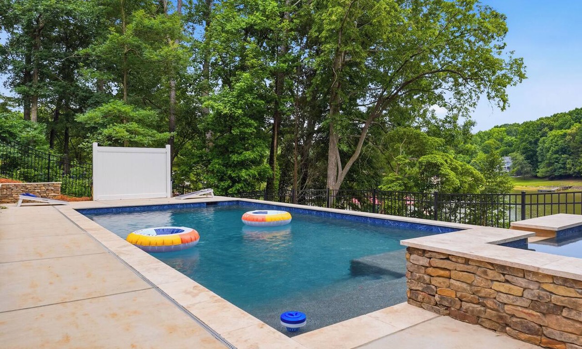 Sherrills Ford House | Waterfront Home + Pool + Spa | Dock + Game Room Near Hiking | Poolside Paradise
