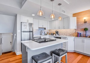 Elegant ocean-view townhome with beach access & pool - perfect location