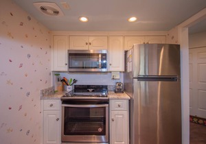 Two-Story Condo with Private Deck, WiFi, & Courtyard Pool Access