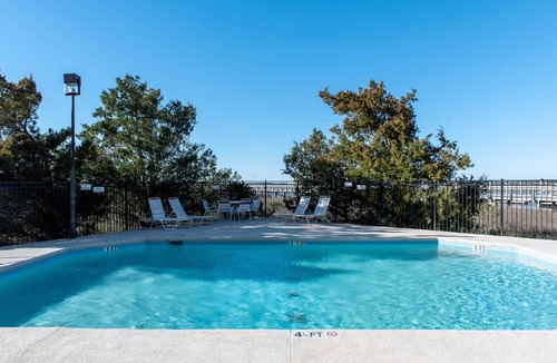 Edisto Island Villa | 111 Bay Creek Villa | 1st Floor Villa | Panoramic Creek, River & Marina Views | Communal Pool