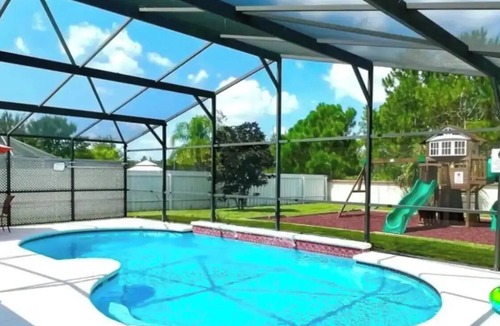 Indian Ridge House | 15 min from Disney Parks! Big House with children's playground, beautiful pool.