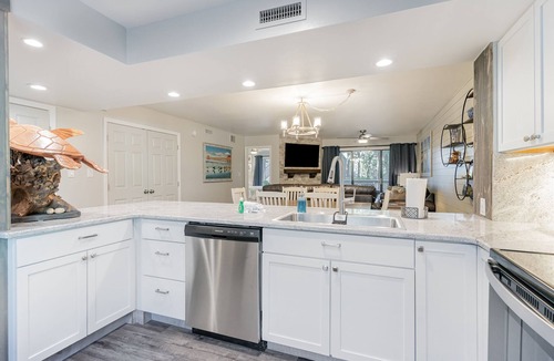 Arcadian Shores Villa | 18C Richmond Park, remodeled villa with full access to amenities