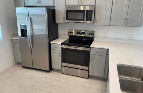 Poinciana House | 2-bedroom, 2/5 bath townhome in westview Kissimmee with cool AC,