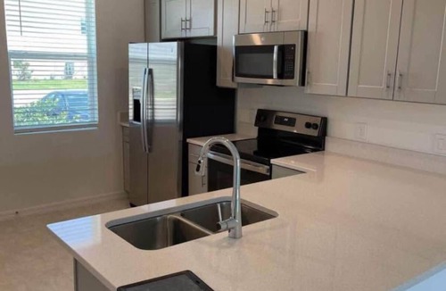 Poinciana House | 2-bedroom, 2/5 bath townhome in westview Kissimmee with cool AC,
