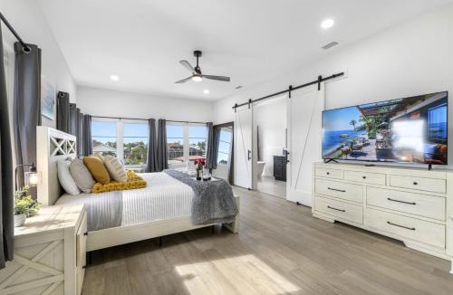 Golf and Sea Village of Apollo Beach House | 2 Million Villa Heated Pool w Luxury Spa 6BR & 6BR Waterfront by Canal