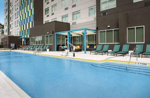 Florida Central Atlantic Coast Hotel | 2 Queen Beds | Tru by Hilton Orlando | with Free Breakfast & Pets are Welcome