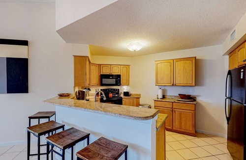 Isla del Sol Condo | 2nd Floor Condo Overlooking Country Club Greens w Free WiFi AC and Shared Pool