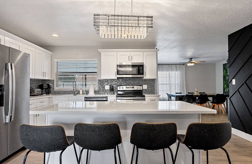 Florida Central Atlantic Coast House | 3/2 plus bonus room W/heated pool & jacuzzi centrally located