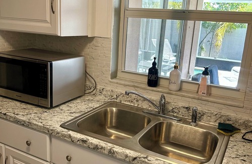 Forest Hills House | 3-bedroom house in Holiday,FL with a beautiful pool oasis. Pool is heated