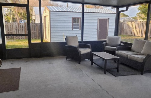 Florida Ridge House | 3-bedroom house in serene Vero Beach with AC comfort. Huge screened in patio