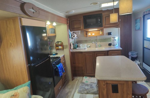 North Topsail Beach House | 35 ft RV, large deck, intercoastal sunset, campground across street from ocean