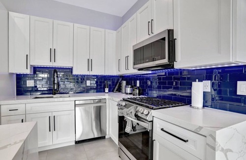 South New River Isles House | 3BR Waterfront Villa with Heated Pool, Spa, & Rooftop Deck