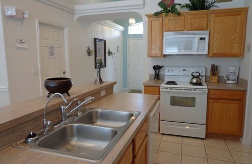 Four Corners House | 4 Bedroom Resort Vacation Home with South Facing Pool & Spa minutes from the attractions.