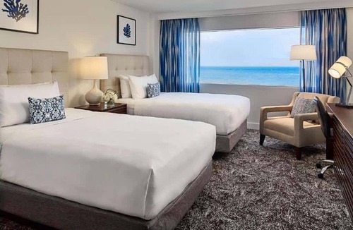 East Fort Lauderdale Hotel | 4 Modern Ocean View Suites with On-site Caribbean Dining, Pool & Fitness Center