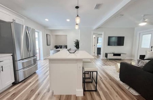 Sun Bay South House | 4107 W Wallace Ave · Stunning Modern 4/2 Pool Home!